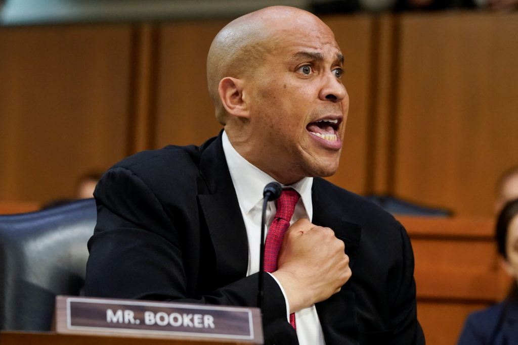 Jackson tears up as Sen. Booker says she earned her historic Supreme Court nomination